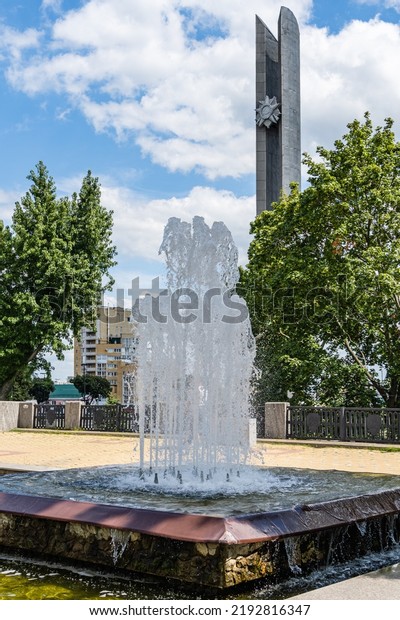 Memorial with stele and fountain in\
the center of Voronezh. Stele in honor of defeat of Nazi troops\
near Voronezh in Patriotic War. Voronezh, Russia - July 30,\
20