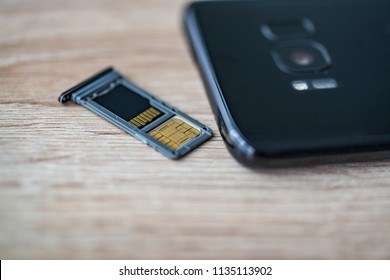 Memory card micro sd and micro sim card tray in smartphone