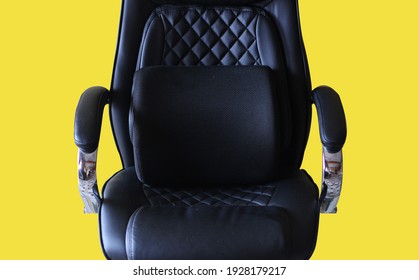 Memory Foam Lumbar Support For Back Pain In Black Office Chair With Yellow Background