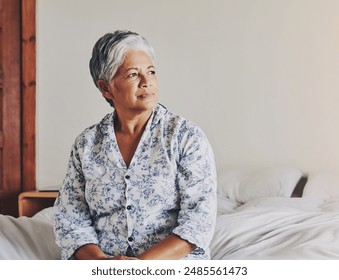 Memory, retirement and thinking with senior woman in bedroom of home for nostalgia of past. Alzheimers, dementia and mental health with elderly person on bed in apartment for grief or loneliness - Powered by Shutterstock