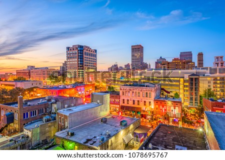 Memphis, Tennesse, USA downtown cityscape at dusk over Beale Street.