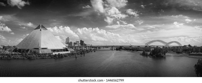 MEMPHIS, TENNESSEE - JUNE 28 2019: Panoramic View Of The Bass Pro Shops At The Memphis Pyramid, Downtown Memphis, The Wolf Creek Harbor, And The Hernando DeSoto Bridge, From The AW Willis Ave Bridge.