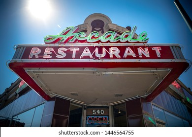 MEMPHIS, TENNESSEE - JUNE 29 2019: The Marquee And Front Door Of The Historic Arcade Restaurant In Downtown Memphis On The Corner Of South Main Street And G.E. Patterson, Displaying Open Sign. 