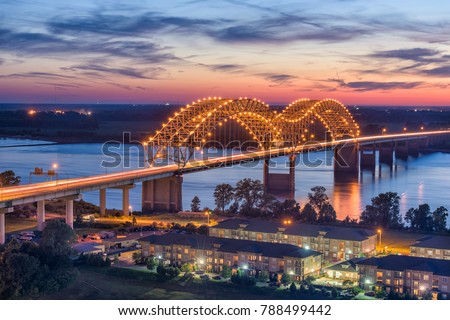 Memphis, Tennessee, USA at Hernando de Soto Bridge at dusk.