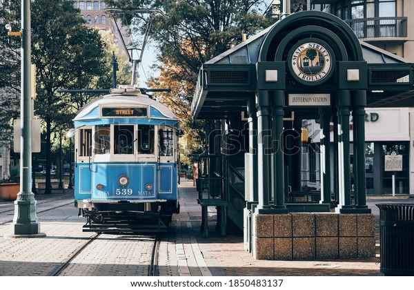 Memphis, Tennessee  USA - November 6 2020: The\
Main Street Trolley pulls into Jefferson Station on a sunny day in\
Memphis.