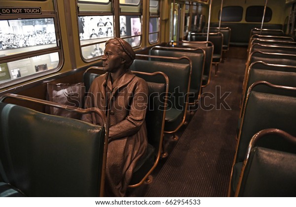 Memphis, TN, USA - June 9,\
2017: Sculpture of Rosa Parks inside bus at the National Civil\
Rights Museum and the site of the Assassination of Dr. Martin\
Luther King Jr.