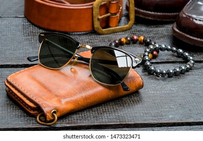 Men accessories, Leather fashion set on wood floor