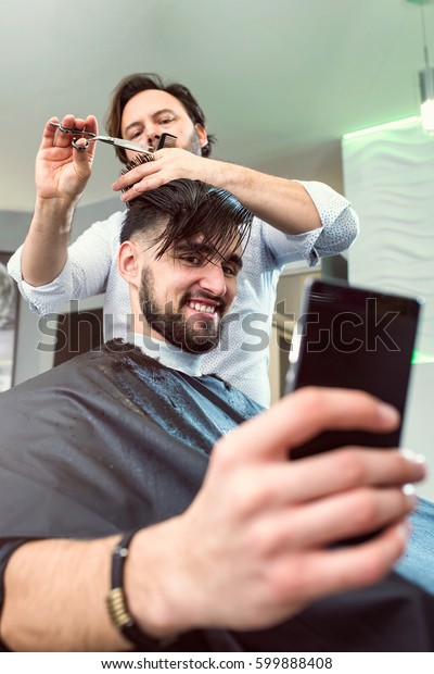 Men Barber Shop Using Smart Phone Stock Photo Edit Now 599888408