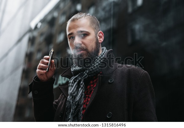 Men Beard Hold Smoke His Electronic Stock Photo Edit Now