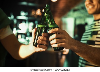 Men with beer celebrating St Patrick's day in pub, closeup - Powered by Shutterstock