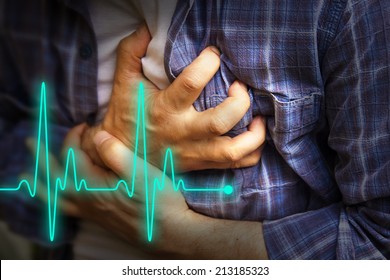 Men in blue shirt having chest pain - heart attack - heartbeat line