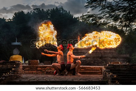 Men breathing fire, amazing light show in thiland