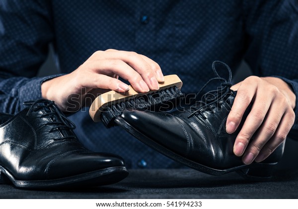 Men to care for leather\
shoes