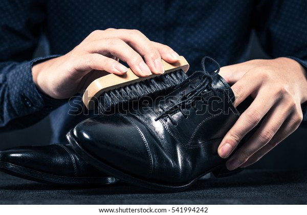 Men to care for leather\
shoes