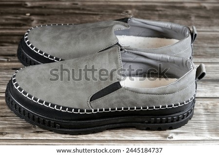 Men casual grey shoes, a shoe is an item of footwear intended to protect and comfort the human foot, shoes provide protection, it has different designs and shapes, selective focus