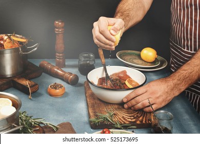 Men Cooking Beef Meat On Kitchen, Copy Space.