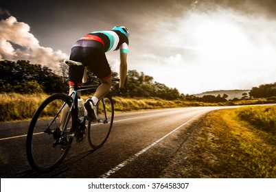  Men cycling road bike in the morning - Shutterstock ID 376458307
