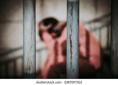 Men Desperate To Catch The Iron Prison,prisoner Concept,thailand People,Hope To Be Free,A Person Guilty Are Punished.