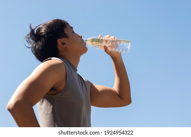 Men Drinking Water Isolated Blue Sky Background