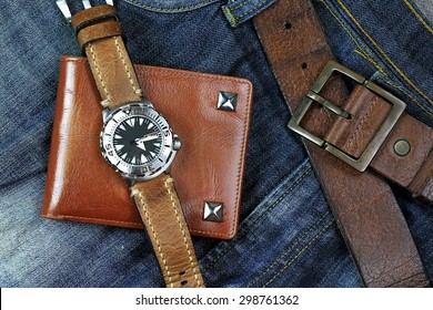 Men fashion and accessories, Wrist watch with brown leather strap, Wallet, Belt.
