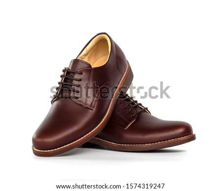 Men fashion brown leather shoes isolated on white background. 