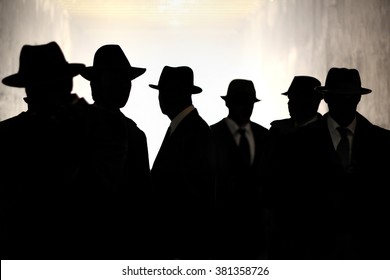 Men Fedora Hats silhouette. Security, Privacy, Surveillance Concept.