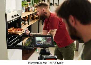 Men Filming Cooking Show At Kitchen