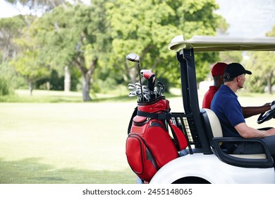 Men, friends and driving golf cart on outdoor field for fitness, clubs and people for sport or exercise. Golfer, athlete and vehicle on green grass for workout, fun and transportation on arena - Powered by Shutterstock