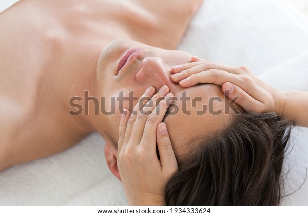 Men are given facial\
massages.