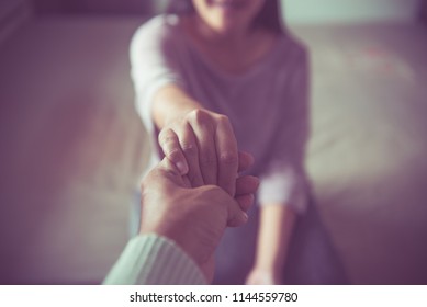 Men Giving Hand To Depressed Woman,Husband Support And Encourage Wife,All Hands In Women Above,Psychiatrist Holding Hands Patient,Compassion Or Empathy,Mental Health Care Concept