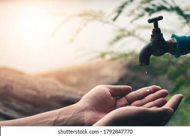 Men Hand Are Waiting To Drink Water In The Water Shortage.