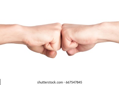 Men hands fist bumping isolated on white background - Shutterstock ID 667547845