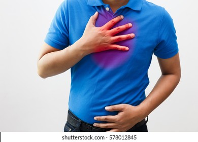  Men Have Symptoms Of Burning Sensation In The Middle Of The Chest Caused By Acid Reflux. /Health And Medical Concepts.