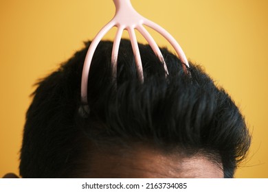  Men Having A Scalp Massage With A Brush ,