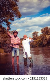 Men hobby and recreation. Fishermen successful catch fish. Fisher retirement. Retired businessman angler in suit with fishing rod. Male friendship. Granddad and drandson fishing.