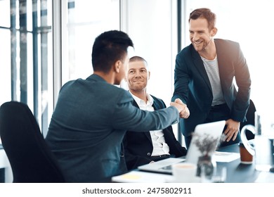 Men, introduction and shaking hands in office at business meeting with smile for welcome, crm and respect. People, handshake and happy with diversity, collaboration and onboarding for job at agency - Powered by Shutterstock