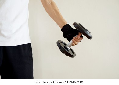 Men are lifting dumbbells. To reduce fat in the arm. - Shutterstock ID 1133467610