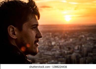 A men looking at the horizon in Paris city, France - Shutterstock ID 1388224436