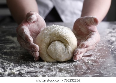 Men Male Female Mom Grandma Mother Hands Sprinkle Kneading A Bread Pie Wheat Dough With Flour Close Up On A Messy Metal Table In The Kitchen, Dough Will Rise Before Baking In Oven