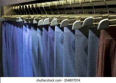 Men Pants Hanging In A Retail Shop