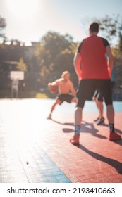 Men Playing Basketball Dribbling Close Up Wide Angle Outdoors Out Of Focus