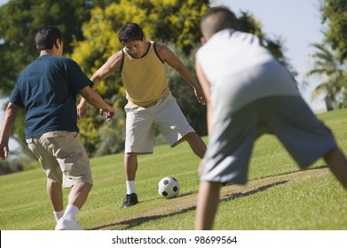 Men Playing Soccer