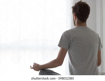 men playing yoga in home - Powered by Shutterstock