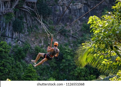 Men Are Playing Zip Line.