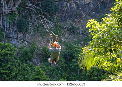 Men Are Playing Zip Line.