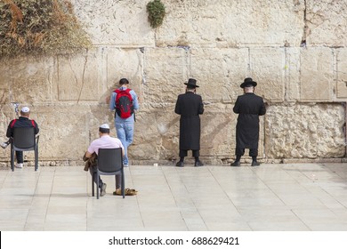 Men Praying At The Wailing Wall, Jerusalem, Israel