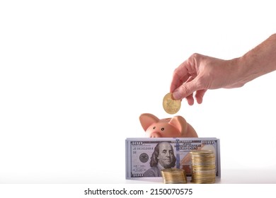 Men Putting Money Coin In The Piggy Bank For Saving Money Wealth And Financial Concept.