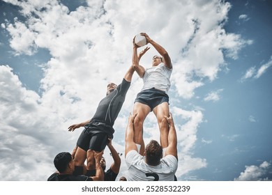 Men, rugby and players with ball or blue sky for scrum, match or game in outdoor tournament or competition. Male person, athlete or sports team with lift for lineout throw, training or practice