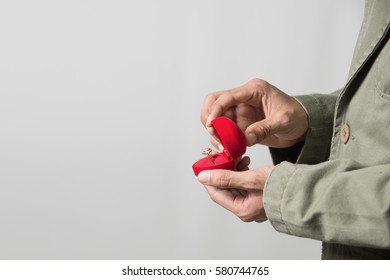 Men show the ring for makes a proposal to marry.wedding concepts