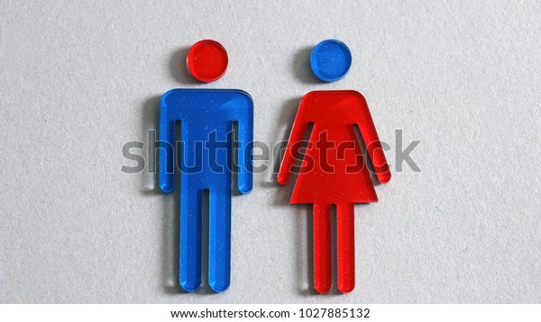 Men sign\
and women sign. Gender equality\
concept.
